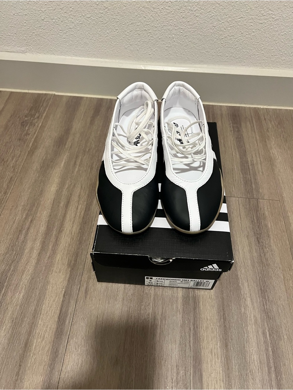 adidas Women’s Black and White Lace-Up Sneakers